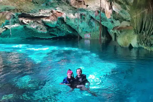 Couple enjoying Dos  Ojos cenote alone