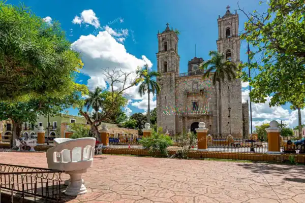 Valladolid main  park with colonial church view