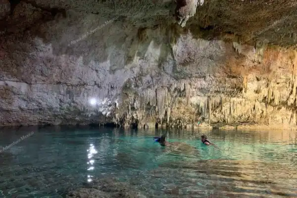 Crystal-clear water of Cenote Choo-Ha cave