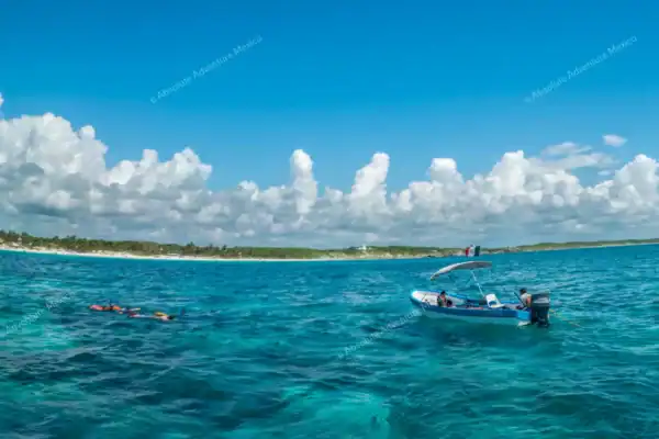 Snorkeling boat  waiting for guests on snorkel Tulum Mexico tour