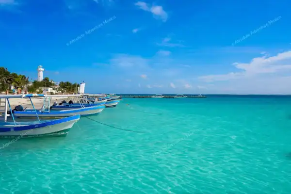 Boat on blue waters  at Puerto Morelos