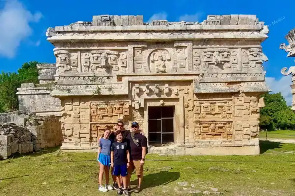 Family at Chichen  Itza Nunnery facade during private tour