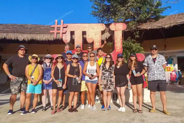 Private group  entering Tulum ruins for tour