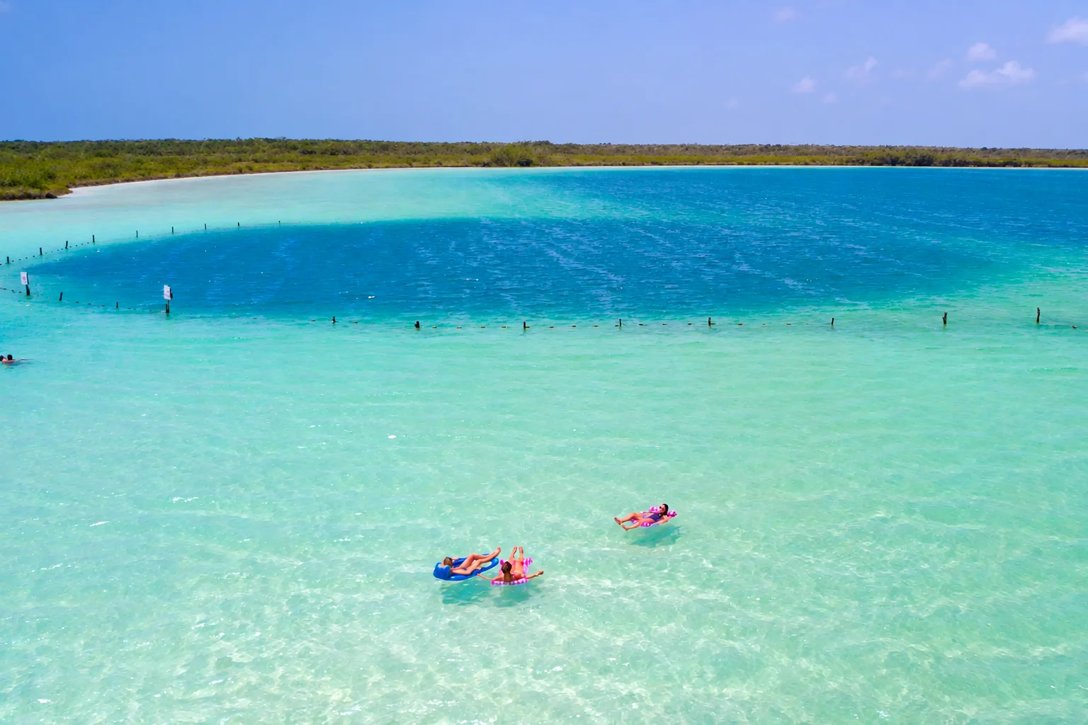 Turquoise shallows and the deep blue center of Kaan Luum Lagoon