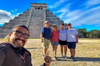 Guide selfie with
  group of four on Chichen Itza private tour