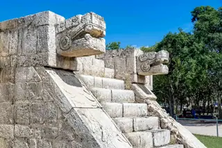 Snake head carving
  close-up at Chichen Itza