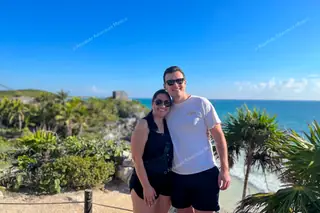 Happy couple at
  Tulum ruins private tour