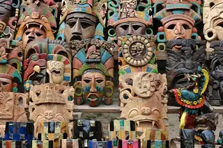 Wooden hand-carved
  mask souvenir Chichen Itza