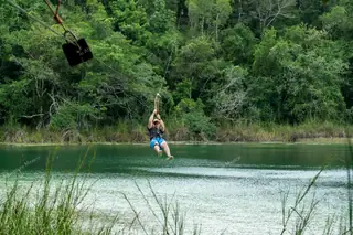 Zipline over lagoon
  at Punta Laguna monkey reserve