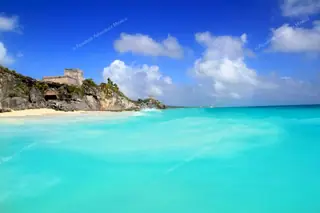 Caribbean Sea view
  of Tulum ruins cliff on Tulum snorkeling tour