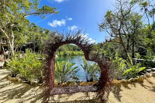 Wooden heart
  sculpture at Cenote Corazón