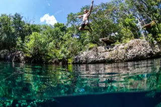 Jumping into jungle
  cenote