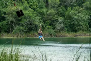 Zipline over lagoon
  at Punta Laguna monkey reserve