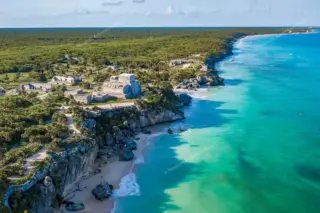 Drone view of Tulum
  cliff coast on Tulum boat tour