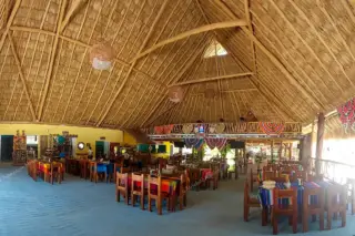 Lunch stop in
  jungle restaurant after Tulum boat tour